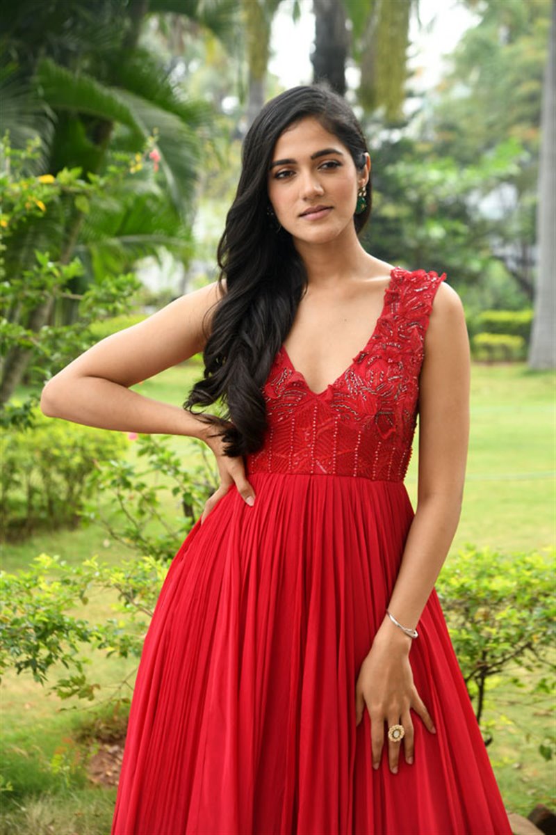 Telugu Actress Simran Choudhary in Red Dress at Atharva Movie Press Meet